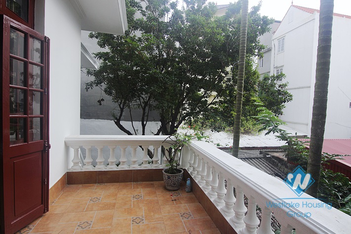 White house with courtyard for rent in Tay Ho district  